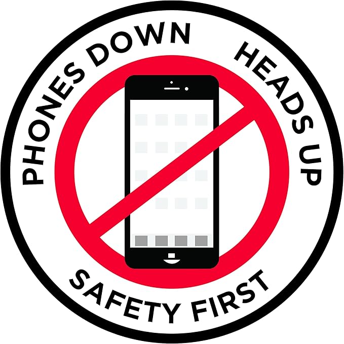 "Phones Down Heads Up" Safety Sign by GraphicalWarehouse