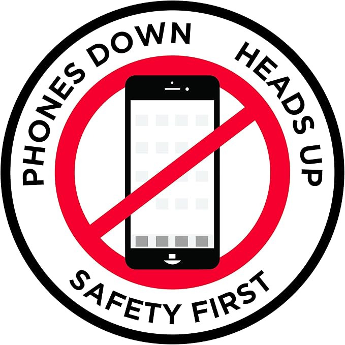 "Phones Down Heads Up" Safety Sign by GraphicalWarehouse